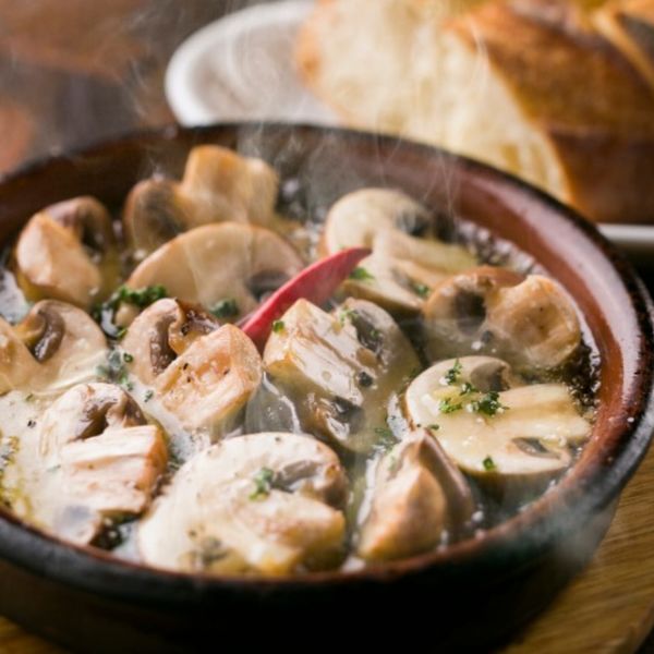 永山のスペイン料理店のアヒージョをお召し上がりください